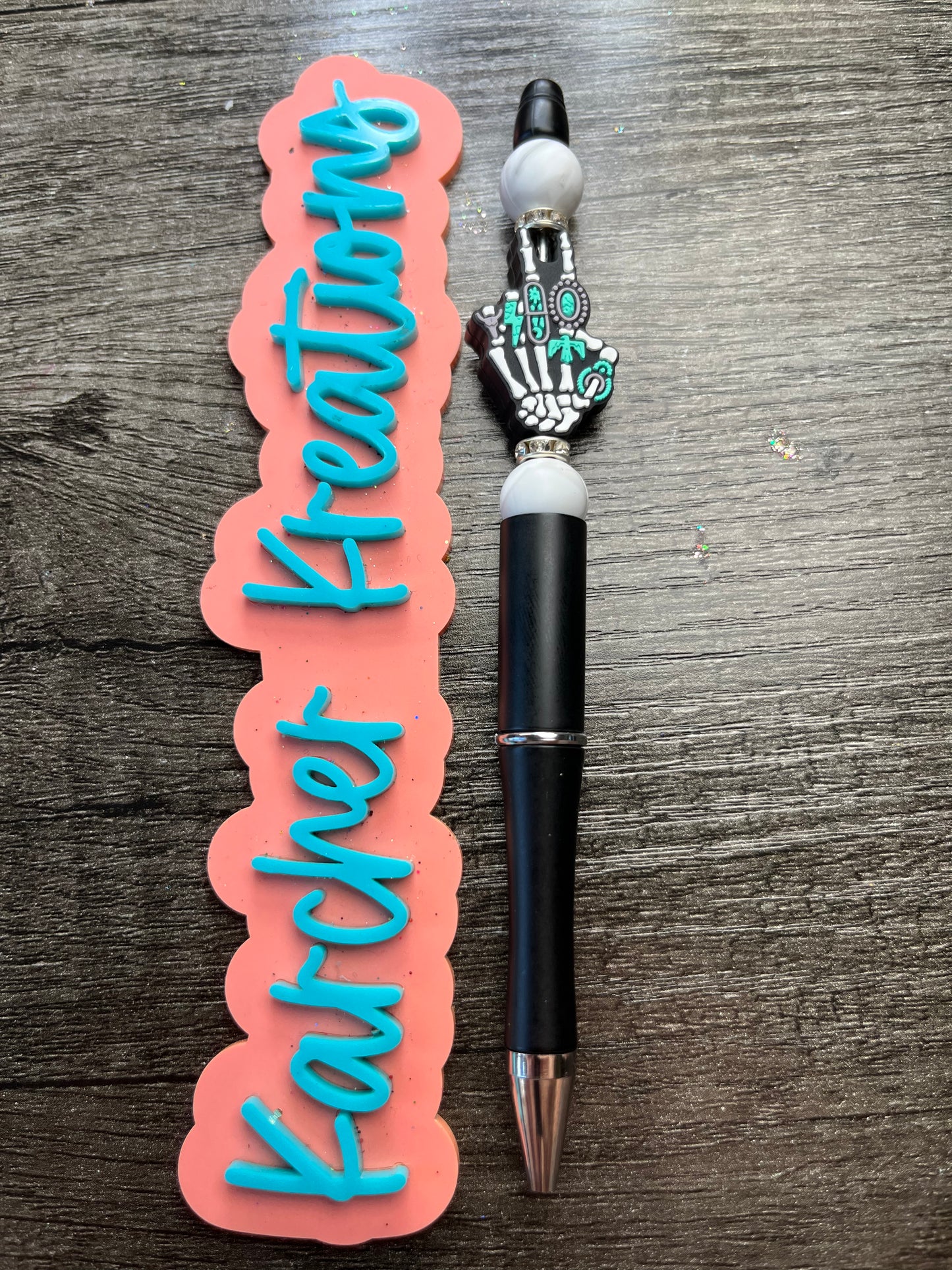 Skull Hand With Turquoise Pen