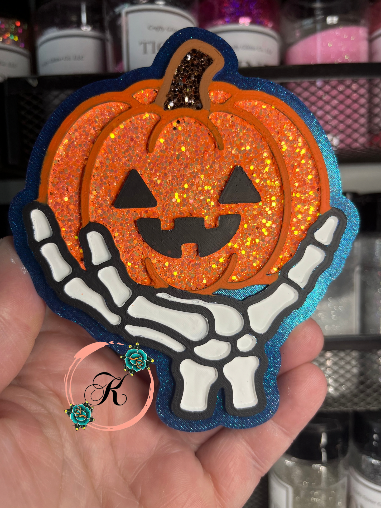 Skeleton Hand Holding Pumpkin Freshie