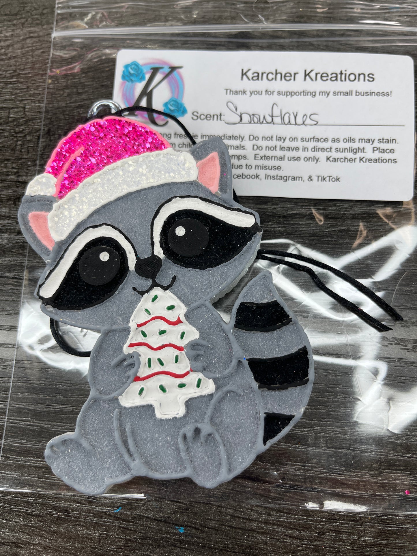 Raccoon with Christmas Cake—snowflakes